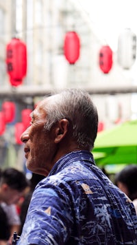 a man wearing a hawaiian shirt