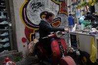 a man on a scooter